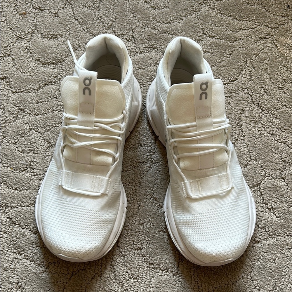 On Running All-White Athletic Shoes